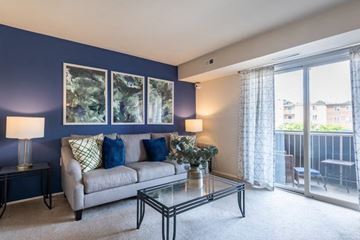 Glen Burnie apartment for rent - a living room with a couch and a glass table