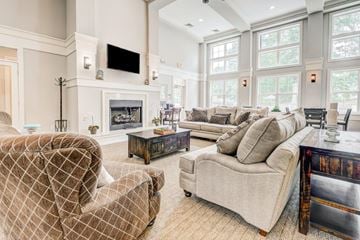 Garner apartment for rent - a living room with couches and chairs and a fireplace
