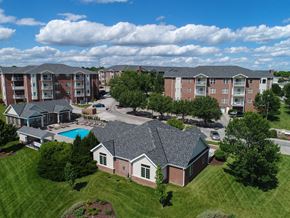 Lincoln apartment for rent - an aerial view of an apartment complex with a swimming pool