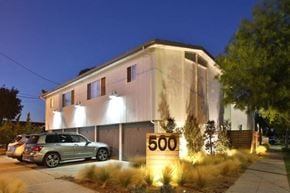 Long Beach apartment for rent - a building with a car parked in front of it