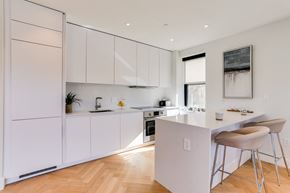 Washington apartment for rent - Newly renovated kitchen with Quartz countertops and an integrated fridge and dishwasher