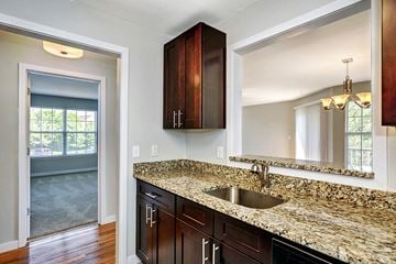 Warren apartment for rent - a kitchen with a granite counter top and a sink
