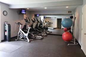 Clarks Summit townhouse for rent - a row of spin bikes in a gym on the floor