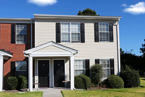 Portsmouth apartment for rent - a white house with black shuttered windows and a white porch