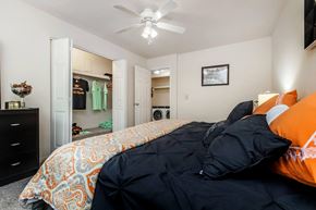 Blacksburg apartment for rent - a bedroom with a bed and a closet