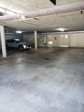 Los Angeles apartment for rent - a parking garage with a car parked in it