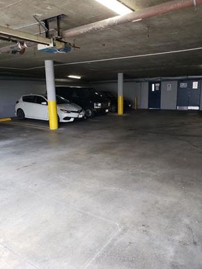 Los Angeles apartment for rent - three cars parked in a parking garage