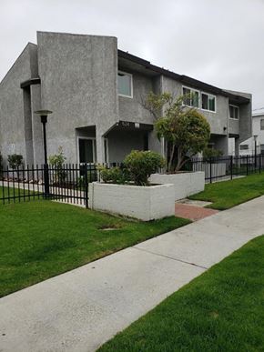 Los Angeles apartment for rent - a house with a sidewalk and a black fence