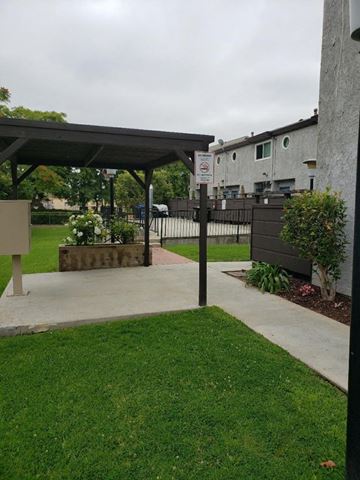 Los Angeles apartment for rent - a patio with a no parking sign in the grass