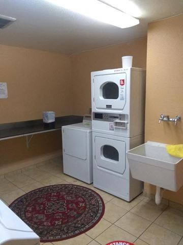 Los Angeles apartment for rent - a kitchen with two washing machines and two microwaves in it