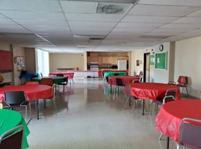 Reseda apartment for rent - a dining room with tables and chairs and a kitchen