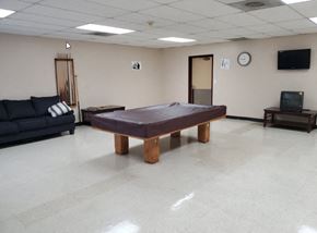 Reseda apartment for rent - a game room with a pool table and a tv