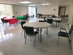 Reseda apartment for rent - a dining room with tables and chairs in a large room