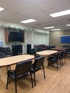 Los Angeles apartment for rent - a conference room with tables and chairs and a tv