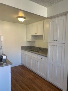 Los Angeles apartment for rent - a white kitchen with white cabinets and a sink