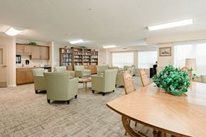 Brandon apartment for rent - A conference room with a long table and chairs.