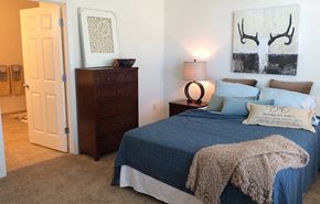 Winchester apartment for rent - a bedroom with a bed and a dresser and a closet