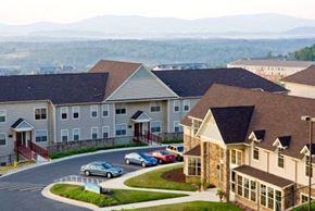 Staunton apartment for rent - a neighborhood with houses and cars parked on a street