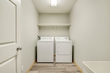 Full-size washer and dryer included