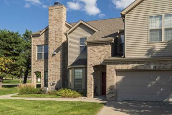 Attached garage included with each home
