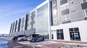Sioux City apartment for rent - a new building with cars parked in front of it