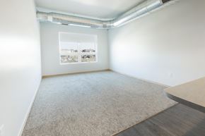 Sioux City apartment for rent - an empty room with white walls and a window