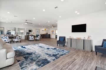 Mesa apartment for rent - the preserve at ballantyne commons community living room with couches and chairs