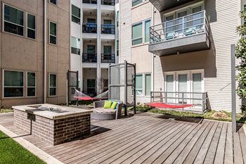 Private courtyard with water feature and activities lawn