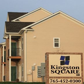 Kokomo townhouse for rent - the front of a house with a sign for kingston square