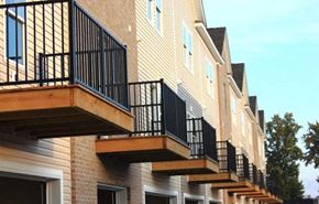 Kokomo townhouse for rent - a row of balconies on the side of a building