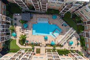 Metuchen apartment for rent - an aerial view of a swimming pool in an apartment building