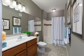 Pasadena townhouse for rent - a bathroom with a sink and a toilet and a shower