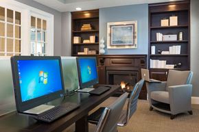 Pasadena townhouse for rent - a home office with two computers and a fireplace