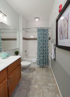 Pasadena townhouse for rent - a bathroom with a shower and a toilet and a sink