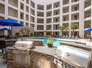 Poolside sundeck and grilling area
