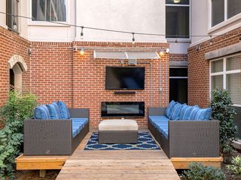 Outdoor sitting area with fireplace