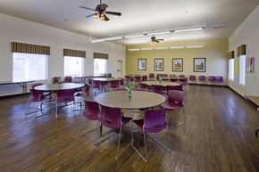 Las Vegas apartment for rent - a large dining room with tables and chairs