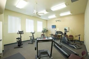 Las Vegas apartment for rent - a gym with various exercise equipment in a room
