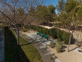 Las Vegas apartment for rent - a park with benches and a path and trees