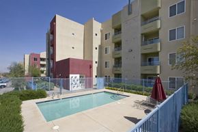 Henderson apartment for rent - a pool in front of an apartment building