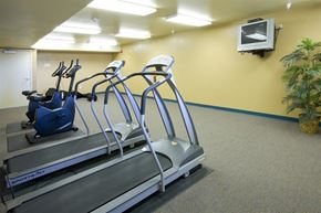 Henderson apartment for rent - a group of exercise equipment in a gym