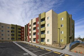 Henderson apartment for rent - a parking lot in front of an apartment building