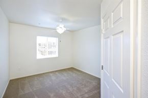 Henderson apartment for rent - an empty bedroom with white walls and a white door
