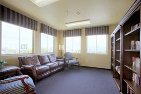 Las Vegas apartment for rent - a living room with a couch and a chair