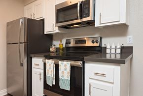 San Diego apartment for rent - Kitchen with stainless steel appliances at Mission Trails Apartments San Diego, California, 92119
