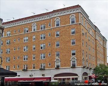Montclair apartment for rent - A large red brick building with many windows.