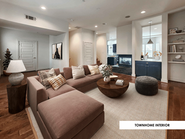 Dallas apartment for rent - A living room with a brown couch and a white lamp.