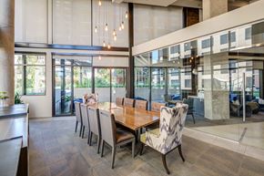 Dallas apartment for rent - a dining room with a wooden table and chairs