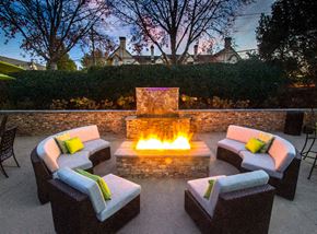 Dunwoody apartment for rent - a patio with chairs and a fire pit