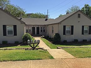 Raleigh apartment for rent - an old with a sidewalk in front of it